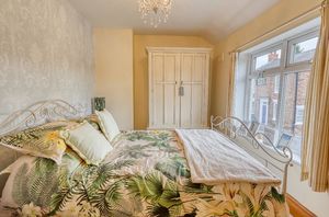 Bedroom One- click for photo gallery